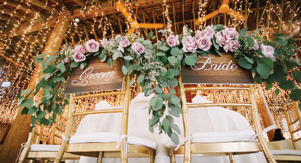 Bride and groom chairs in wedding venue